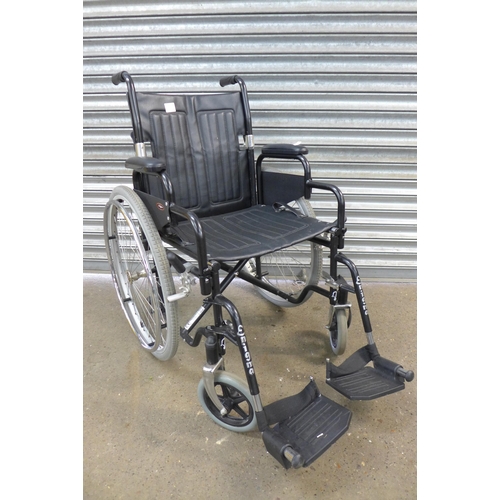 2295 - A black Enigma self propelled wheelchair with footrests