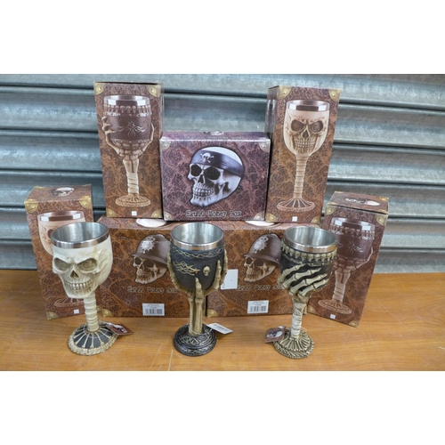 2304 - 10 mixed skull money boxes and goblets