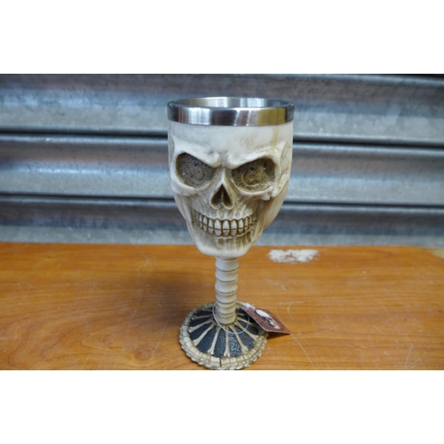 2304 - 10 mixed skull money boxes and goblets