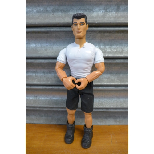 2305 - 11 assorted Action Men dolls and other items