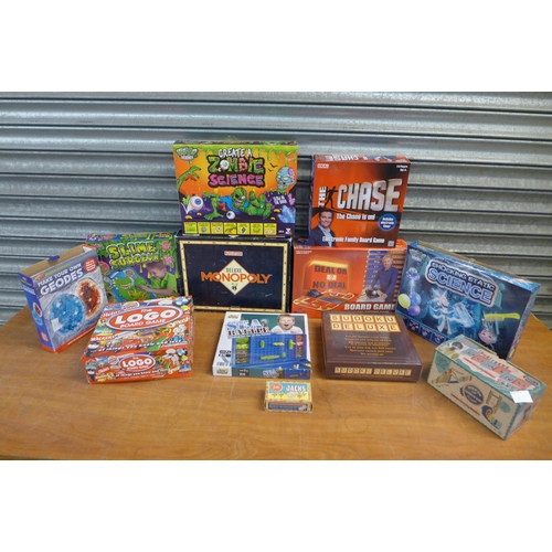 2311 - 12 boxed games including Deluxe Monopoly, Deal or No Deal board game, The Chase board game, create a... 