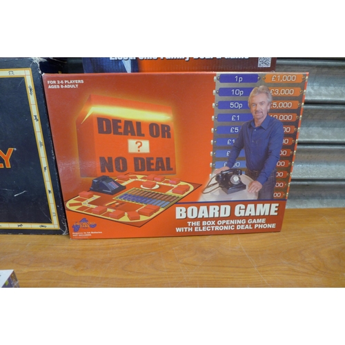 2311 - 12 boxed games including Deluxe Monopoly, Deal or No Deal board game, The Chase board game, create a... 