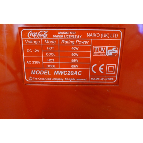 2321 - A Red Coca-Cola branded portable mini fridge DC12V AC230V, hot cool model No NWCZOAC with two vintag... 