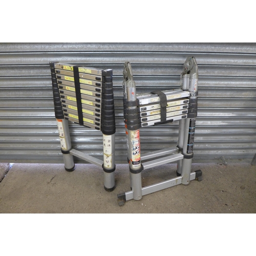 2323 - A set of telescopic Matrix Access ladders and 1 other telescopic ladders