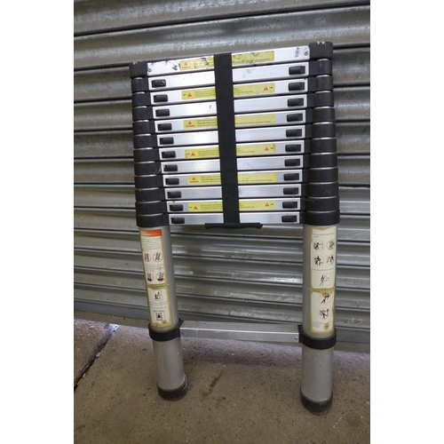 2323 - A set of telescopic Matrix Access ladders and 1 other telescopic ladders