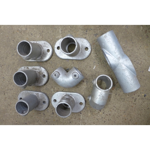 2338 - A large quantity of galvanized pipe joints including bases and elbow joints etc.