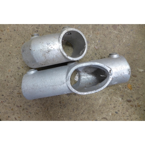 2338 - A large quantity of galvanized pipe joints including bases and elbow joints etc.