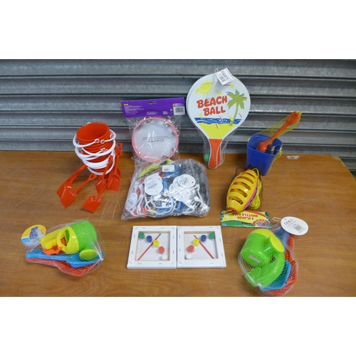 2349 - A large plastic box of assorted beach toys and other toys