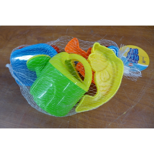 2349 - A large plastic box of assorted beach toys and other toys