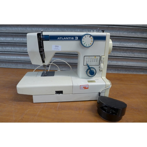 2352 - An Atlantis 3 model 5001, 240V electric sewing machine with pedal - Failed electrical safety test du... 