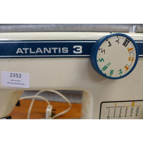 2352 - An Atlantis 3 model 5001, 240V electric sewing machine with pedal - Failed electrical safety test du... 