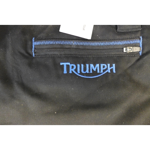 2378 - A quantity of Triumph motorcycles clothing including size XXXL and XXL navy workshop pants, XL shirt... 