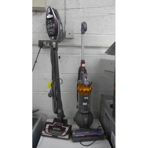 2185 - A Dyson multi floor small ball upright vacuum cleaner and a Shark Rocket True-Pet corded stick vacuu... 