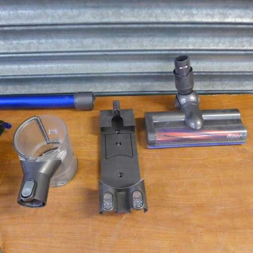 2189 - A quantity of Dyson vacuum parts and spares for repairs including brush heads, cyclone parts, motors... 