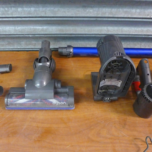 2189 - A quantity of Dyson vacuum parts and spares for repairs including brush heads, cyclone parts, motors... 