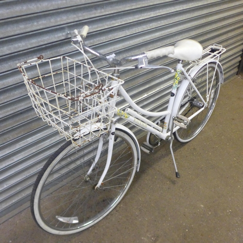 2216 - A Raleigh Caprice lady's Step Through bicycle with front basket and pannier rack