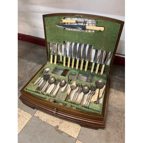 372 - A walnut cased Viner & Hall Corinthian part canteen of cutlery, with faux ivory handles