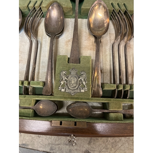 372 - A walnut cased Viner & Hall Corinthian part canteen of cutlery, with faux ivory handles