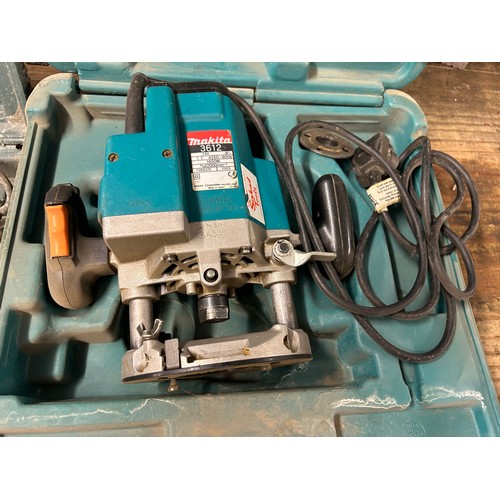 2409 - 2 cased power tools - Hitachi CJ110MU jigsaw, Makita 3612 240 plunge router