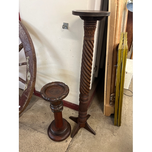 376 - Two carved mahogany jardiniere stands