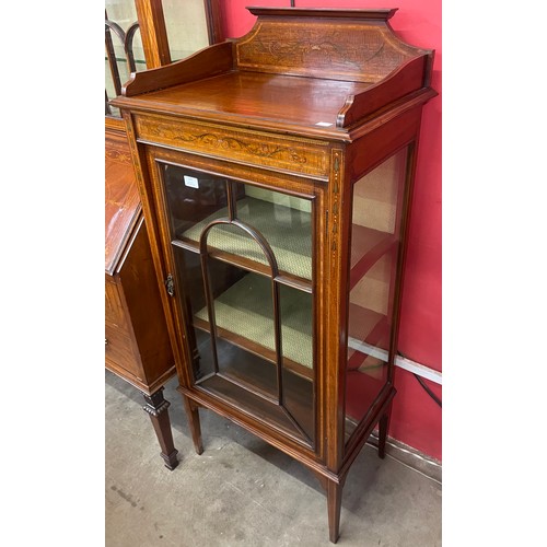 120 - An Edward VII inlaid mahogany single door display cabinet