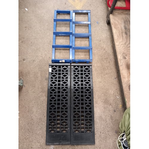 2403 - A pair of Sealey metal van ramps and a pair of Laser plastic car ramps