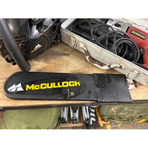 2404 - A McCulloch CS360T petrol driven chainsaw and a Perles SRE5-8135, 240V hammer drill in tool case