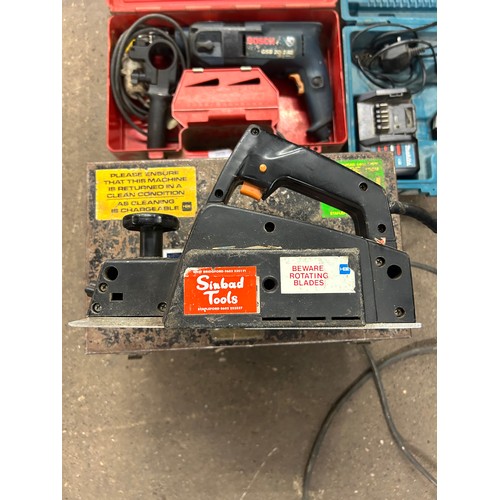 2410 - 3 cased power tools - Bosch GSB 20-2 RE hammer drill, Teksan P800 planer and a Makita HP347D, 14.4V ... 