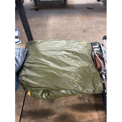 2393 - A large quantity of camping equipment including a Coleman Cedar Creek 5-person tent, ground sheet, a... 