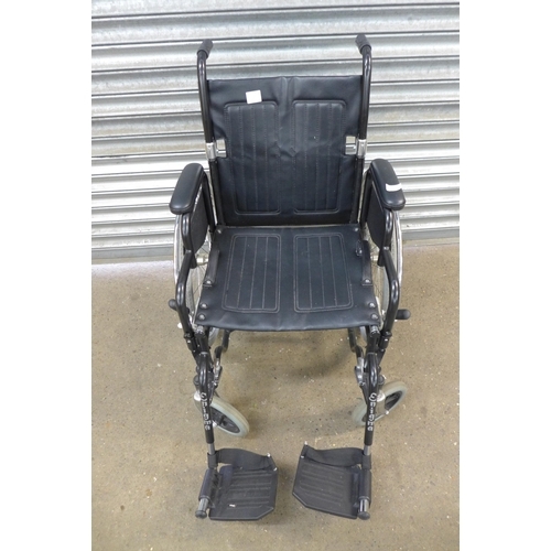 2295 - A black Enigma self propelled wheelchair with footrests