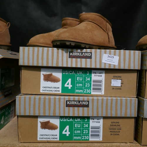 3429 - 2 pairs of chestnut shearling childs boots - UK size 3  *This lot is subject to VAT