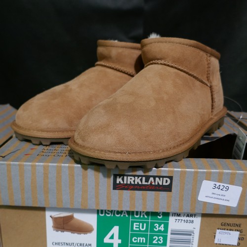 3429 - 2 pairs of chestnut shearling childs boots - UK size 3  *This lot is subject to VAT