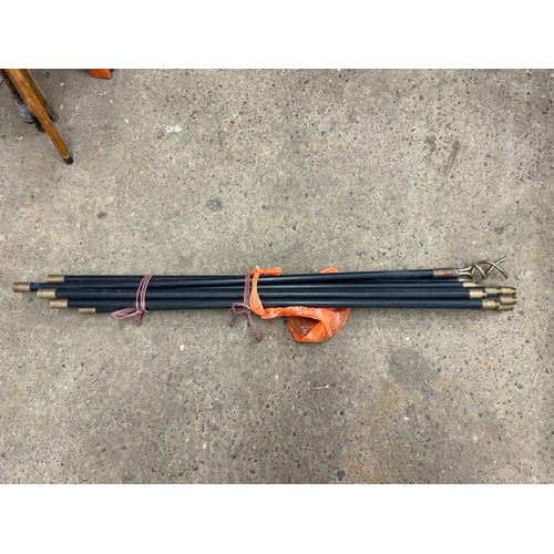 2302 - A 10 piece set of drain rods