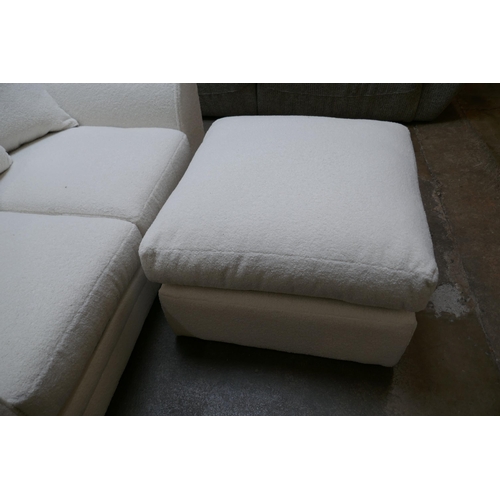 1605 - A white upholstered two seater sofa and footstool