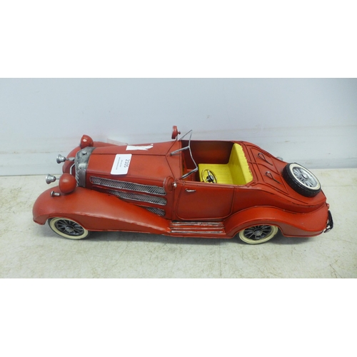 2074 - A tin plate model car