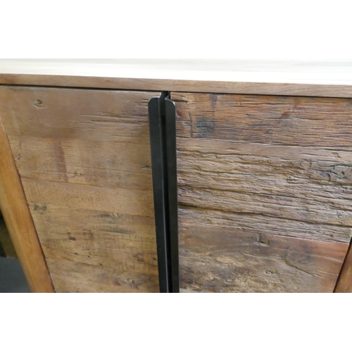 1317 - An oval railway sleeper two door drinks cabinet  *This lot is subject to VAT