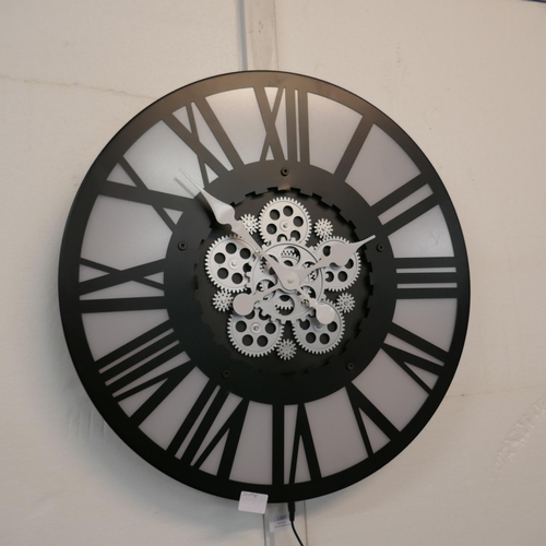 1332 - An illuminated moving gears wall clock