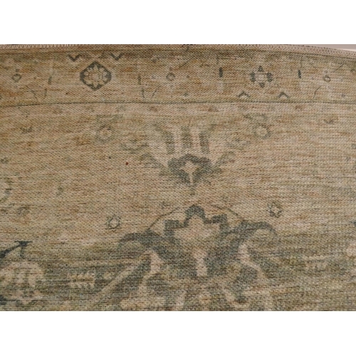 1352 - A green ground vintage look contemporary rug 170 x 120cm