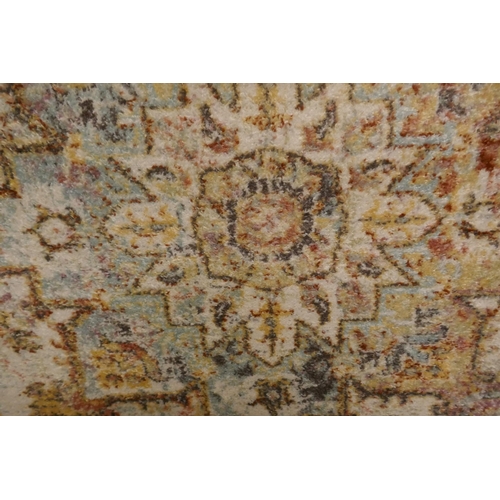 1356 - A Cream ground full pile vintage look rug with hints of duck egg blue (230x160cm)