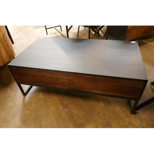 1379 - A black and grooved hardwood coffee table  *This lot is subject to VAT