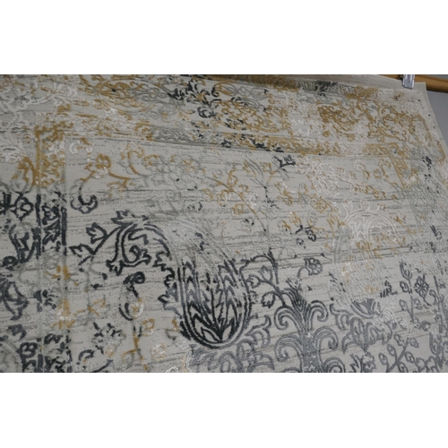 1386 - A full pile grey ground vintage look rug, with a contemporary pattern, 230 x 160cm