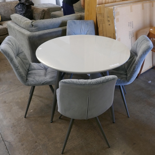 1444 - A Logan circular dining table and four Aran grey velvet chairs