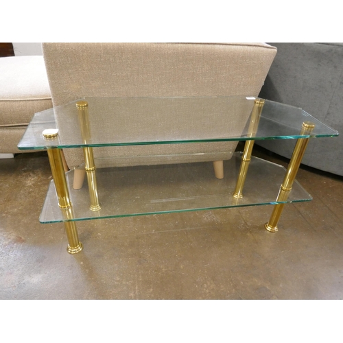 1448 - A two tier corner table with toughened glass and solid brass legs