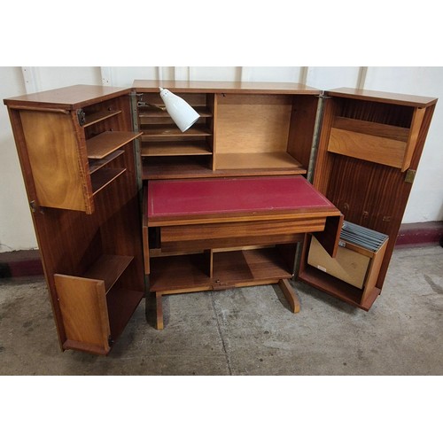 21 - A Newcraft Ltd. teak Home Office cabinet