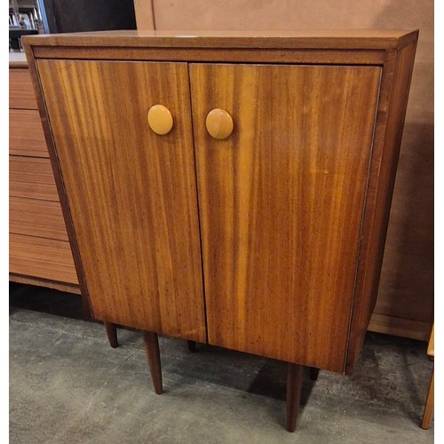 66 - A teak two door cabinet