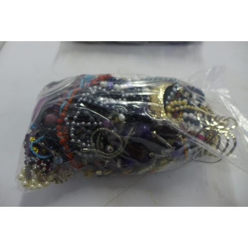 2057 - 2 bags of costume jewellery