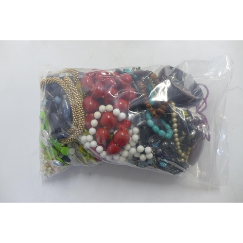 2060 - 2 bags of costume jewellery