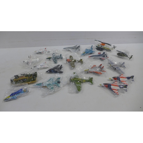 2068 - A box of 20 metal collectable planes, helicopters and other model vehicles