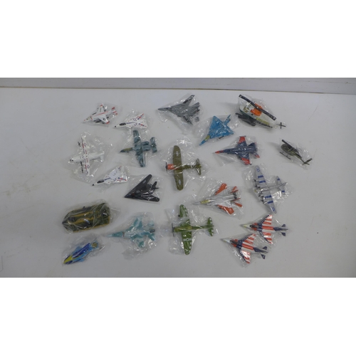 2068 - A box of 20 metal collectable planes, helicopters and other model vehicles