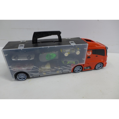 2084 - 3 car transporter toys including 34 collectable toy cars